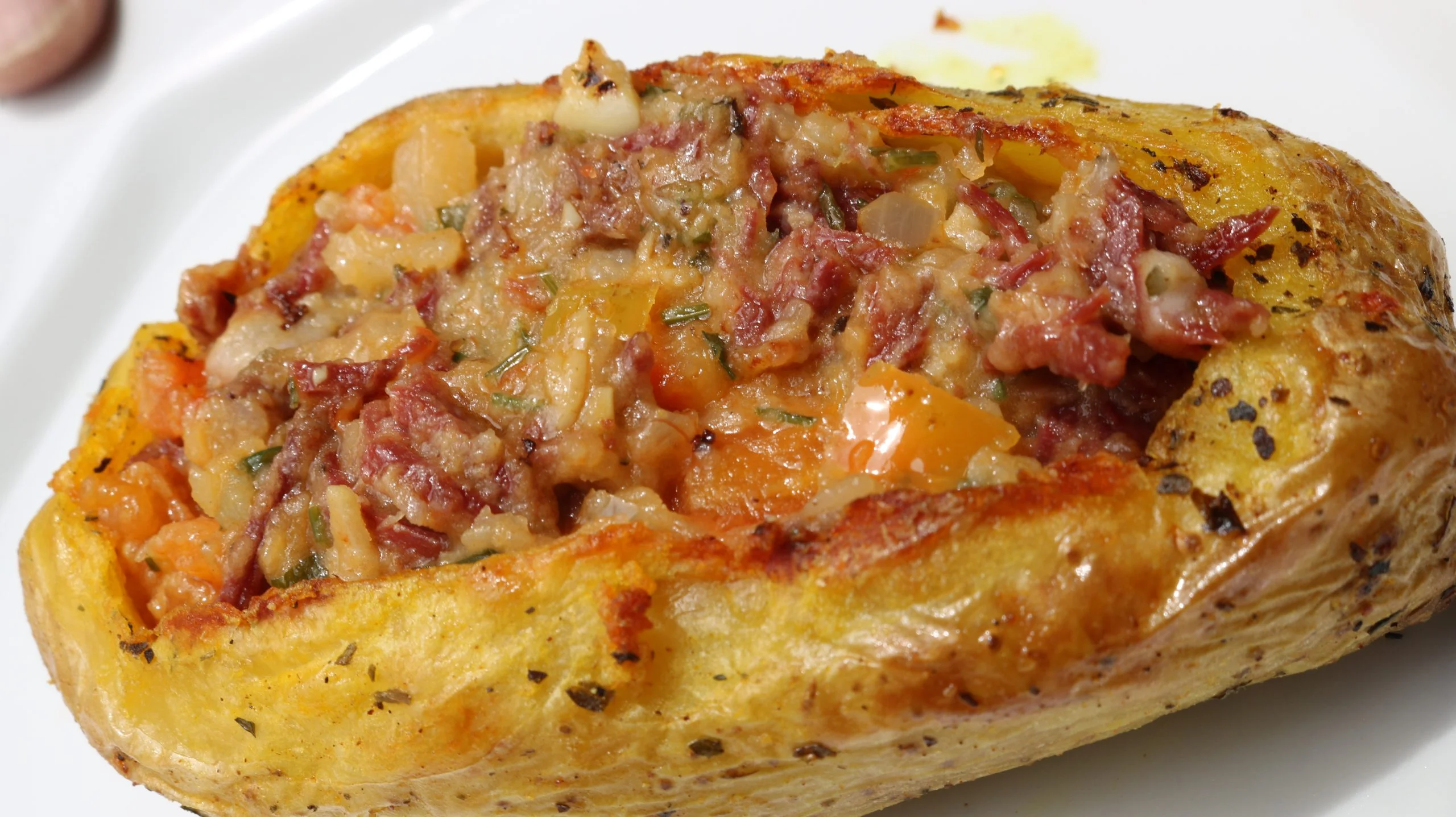 Ricetta patate ripiene al forno: una vera goduria per il palato!